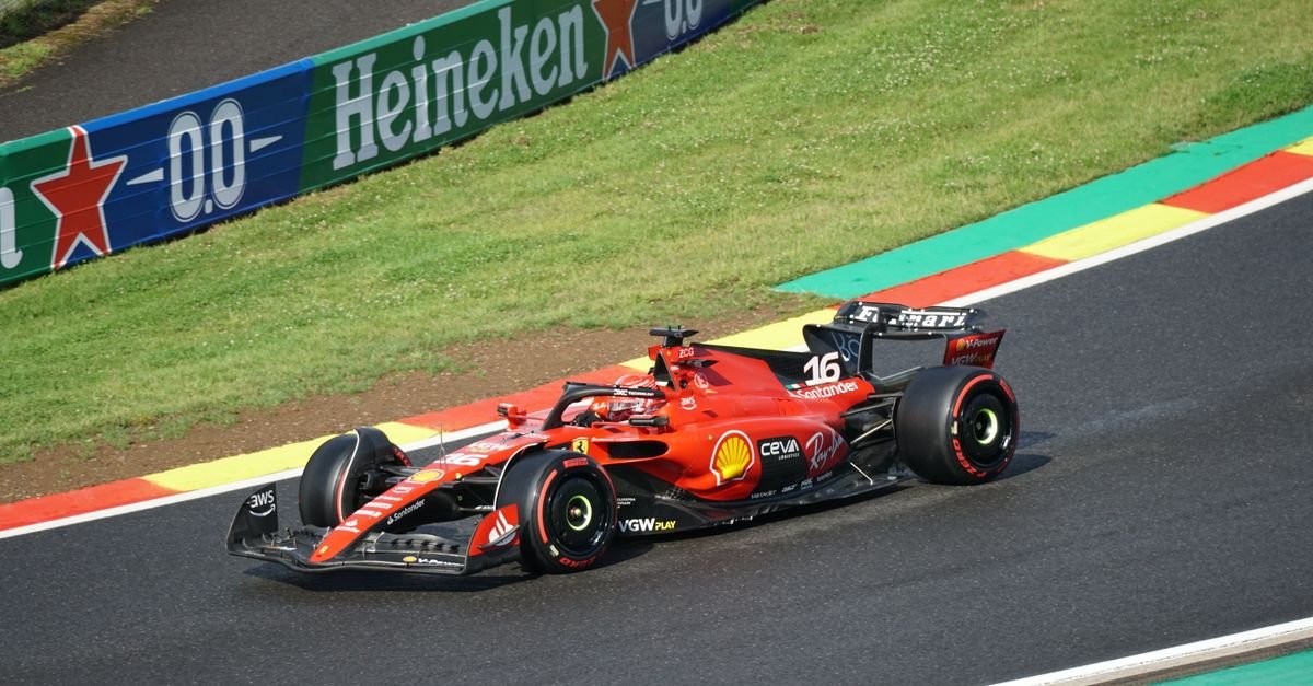 Ferrari Formula 1 car racing on a track during a Grand Prix event.