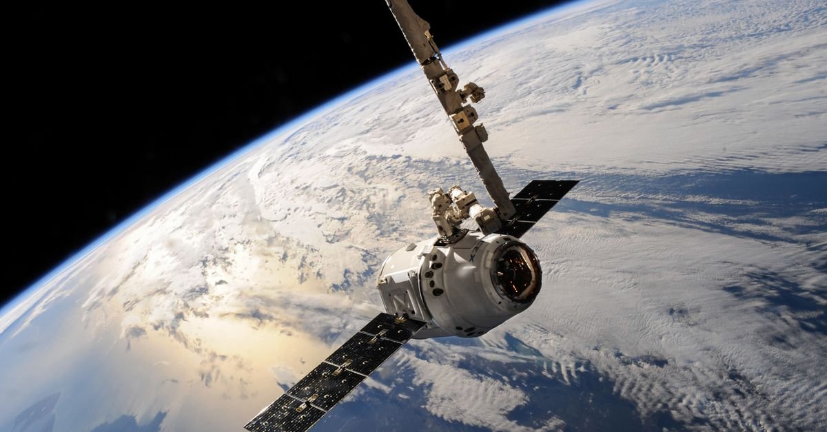 A satellite glides over Earth showcasing dramatic cloud formations and the vast expanse of space.